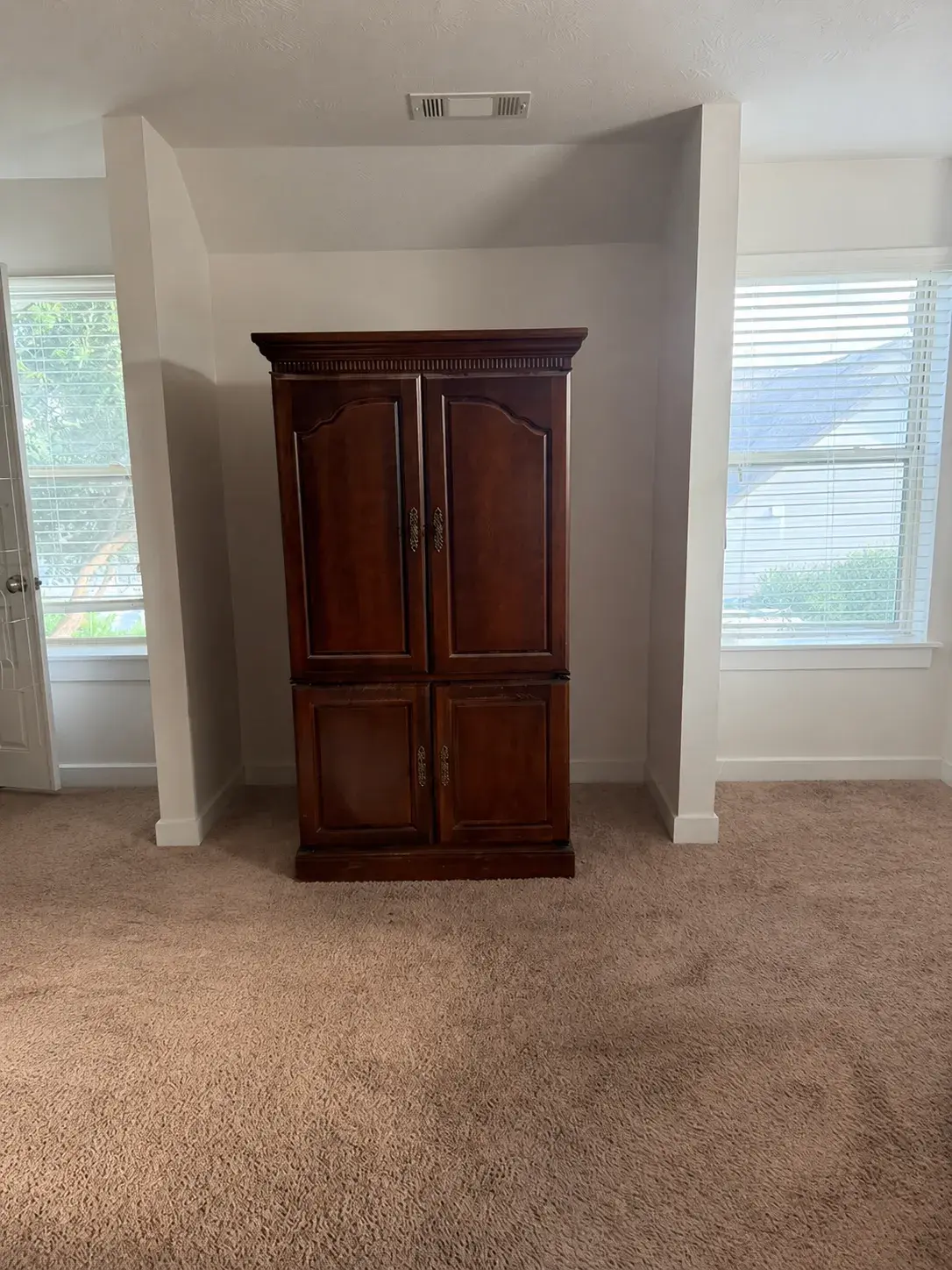 Unused nook to custom built-in cabinetry before remodel