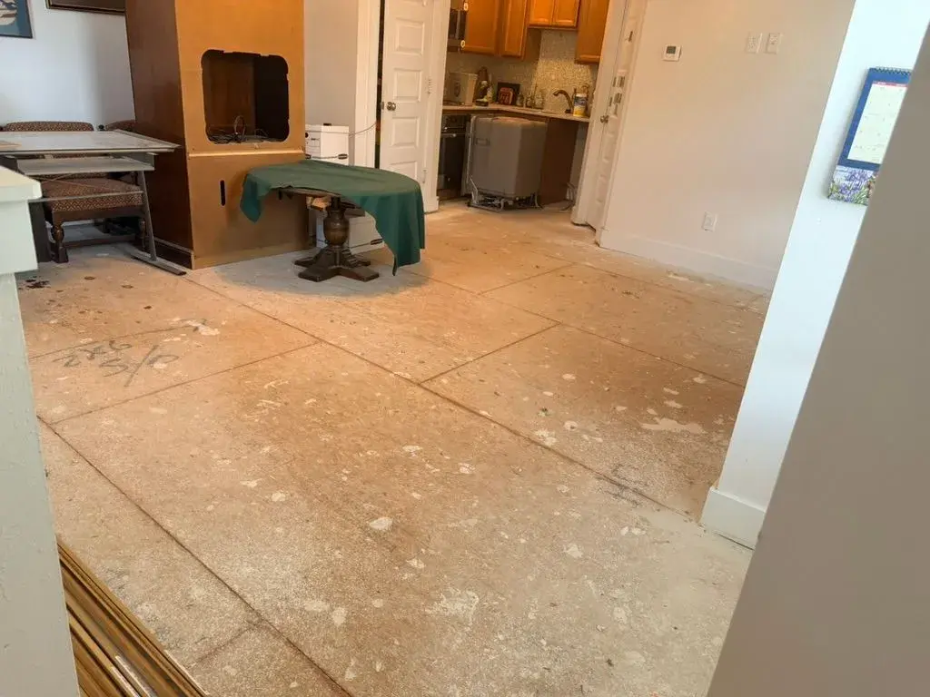 White oak flooring through the living room before remodel