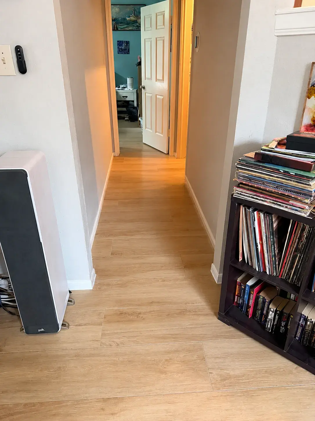 Dated laminate to light oak flooring after remodel by YG Reno