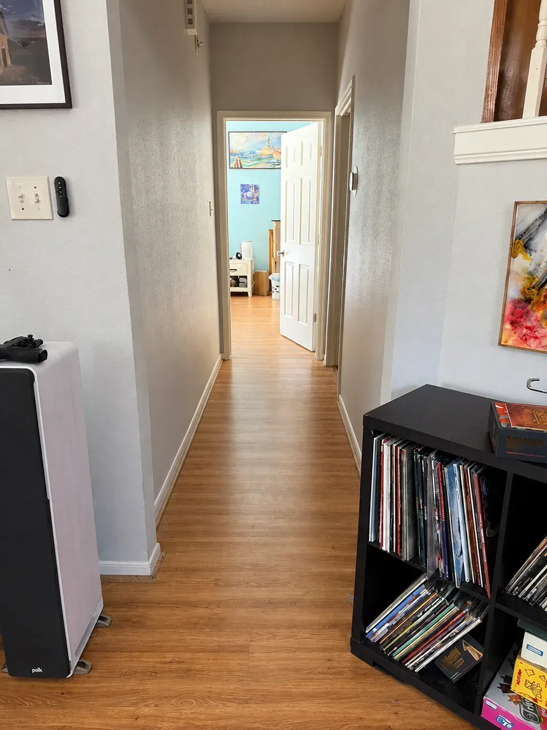 Dated laminate to light oak flooring before remodel