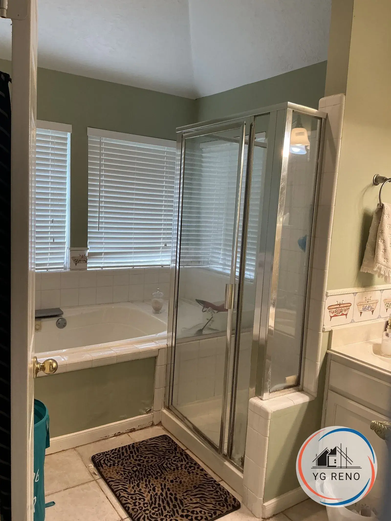 Corner shower and garden tub to frameless walk-in before remodel
