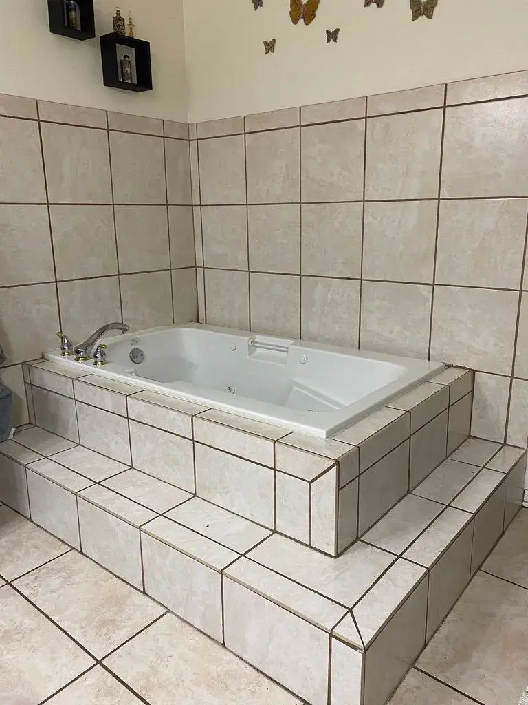 Garden tub to walk-in shower before remodel