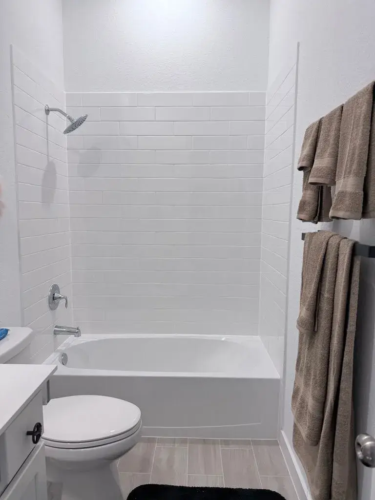 Builder tub to glass shower before remodel