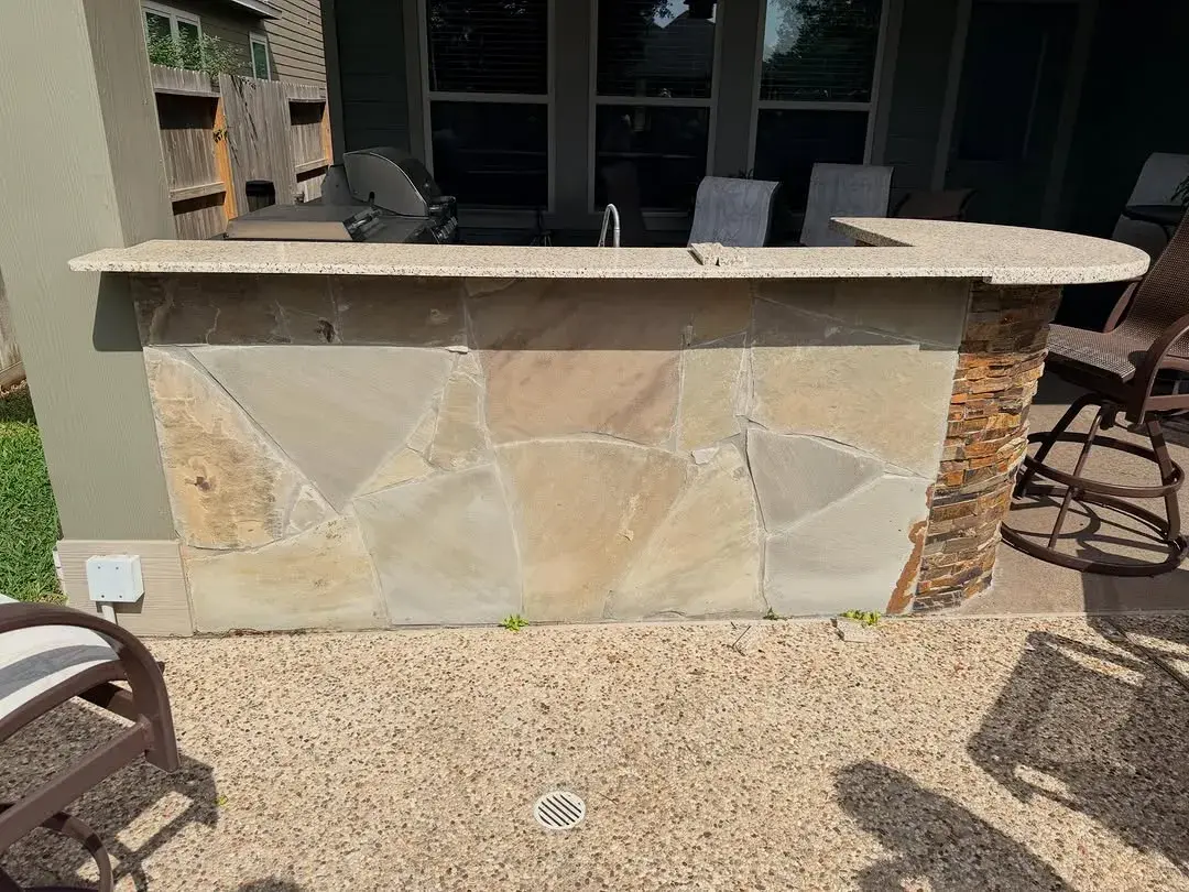 Stone outdoor kitchen and bar
