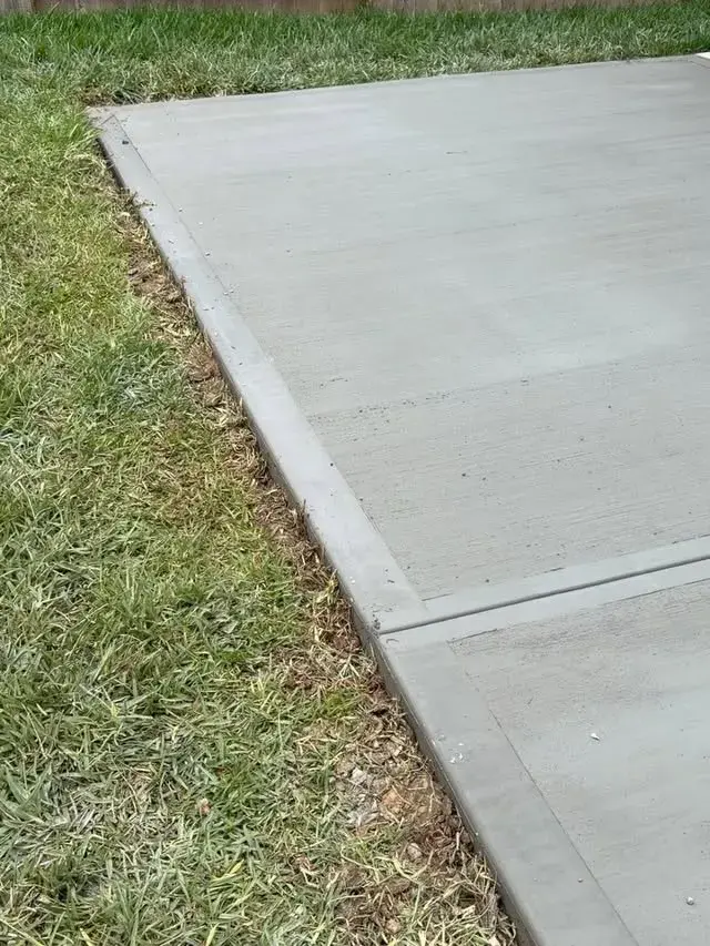 Poured concrete patio extension